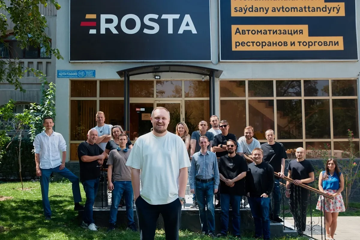 Команда ROSTA у входа в офис в Алматы